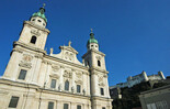 Salzburg Cathedral - Fortress in the background | © Fräulein Maria's Bicycle Tours
