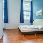 immagine di Camera a due letti, bagno, WC | © PYKADO Photography by Paul Kuchel