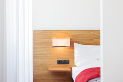 ARCOTEL Castellani Junior Suite Schlafzimmer