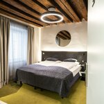 Photo of double room with bath tub, WC