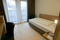 Einzelzimmer mit Balkon