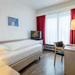 Photo of single room with bath tub, WC