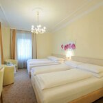 Image de Chambre à 4 lits, douche et baignoire, WC | © Hotel Scherer