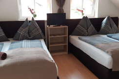 Schlafzimmer mit Flat-Screen