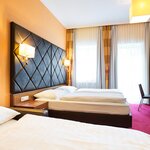 Bild von Dreibettzimmer